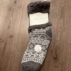 Gray white fuzzy socks with non slip grip bottoms
